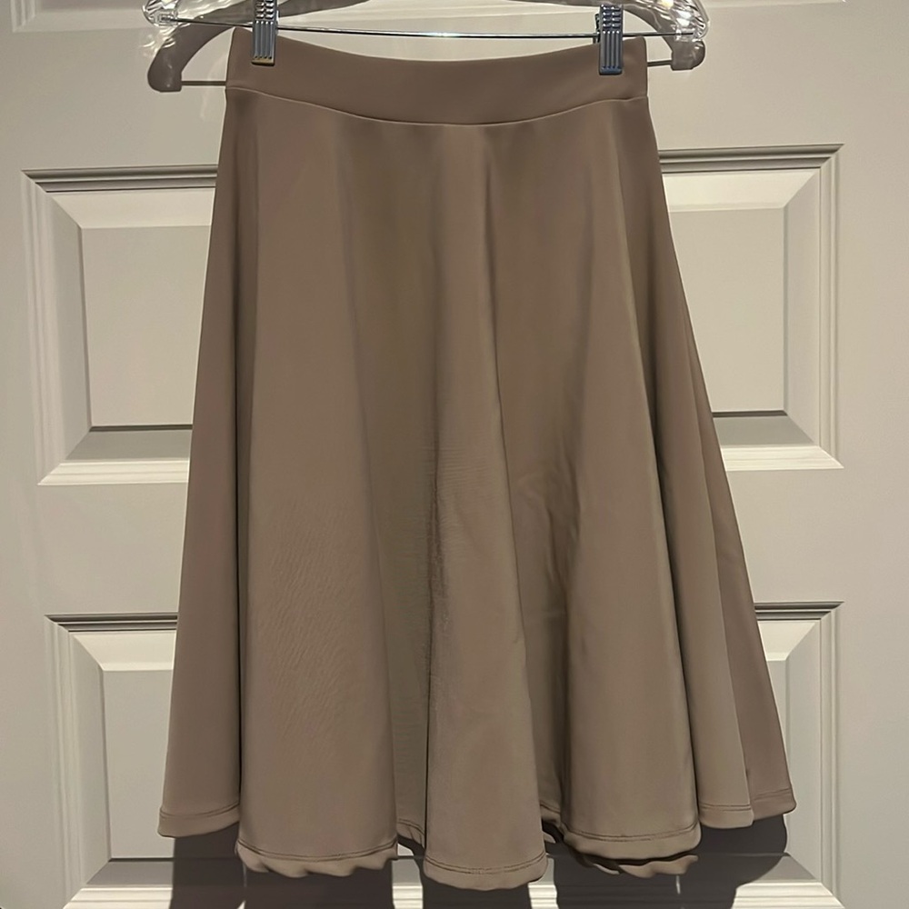 Tan colored circle skirt, ~24in. Long
